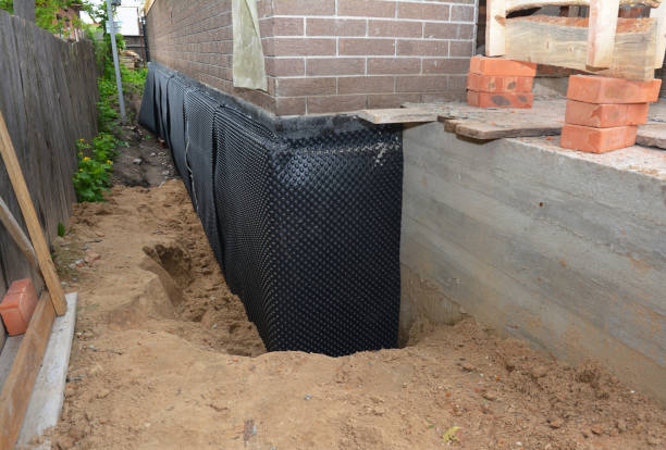 SJ Waterproofing Pros technician performing targeted Waterproofing assessment in Aberdeen, MD